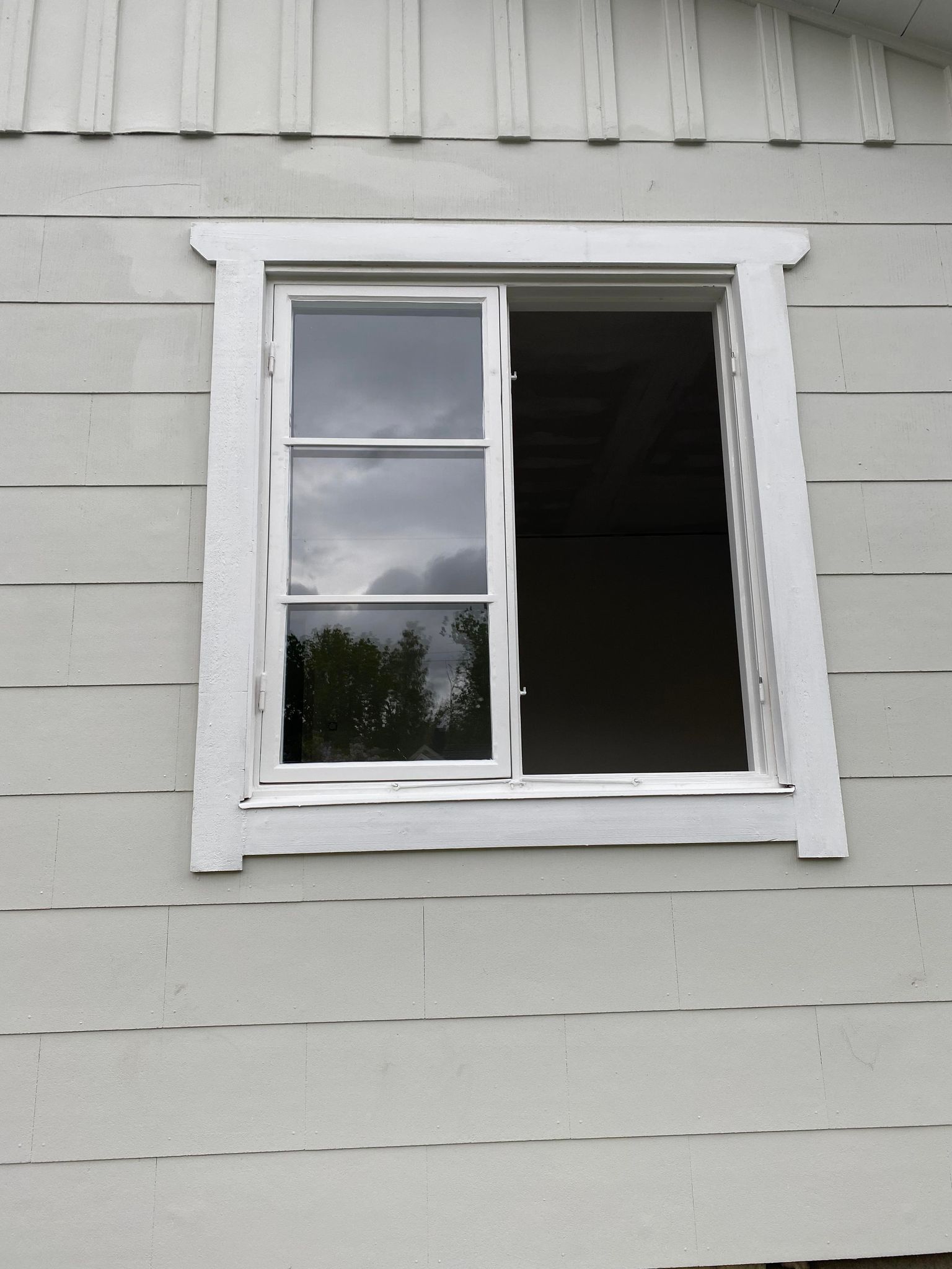 Hus och fönster målning i Solna åt en privat kund 